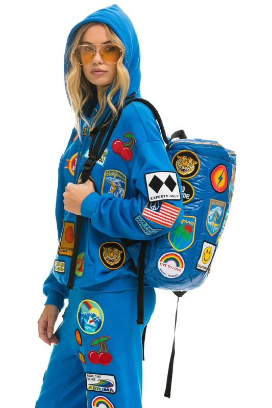 VINTAGE PATCH PUFFER BACKPACK - SNORKEL BLUE GLOSSY